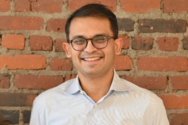 meowenith_A_photo_of_the_CEO_Michael_Kramm_smiling_and_wearin_0fb46fa1-0b27-4221-9c2e-a93051171eca_3.png