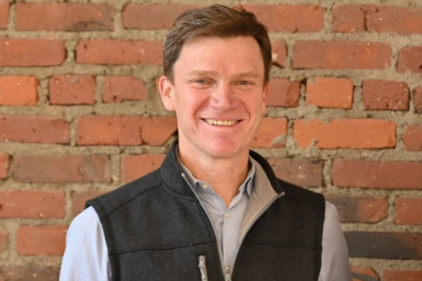 meowenith_A_photo_of_the_CEO_Michael_Kramm_smiling_and_wearin_9a8a3b75-18bb-4a0e-9f0b-654ca9ec6604_3